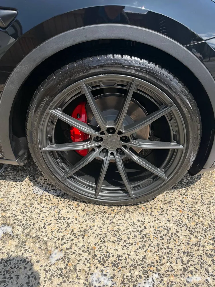 Tesla Model Y, alloys and calipers, detailed in Brisbane