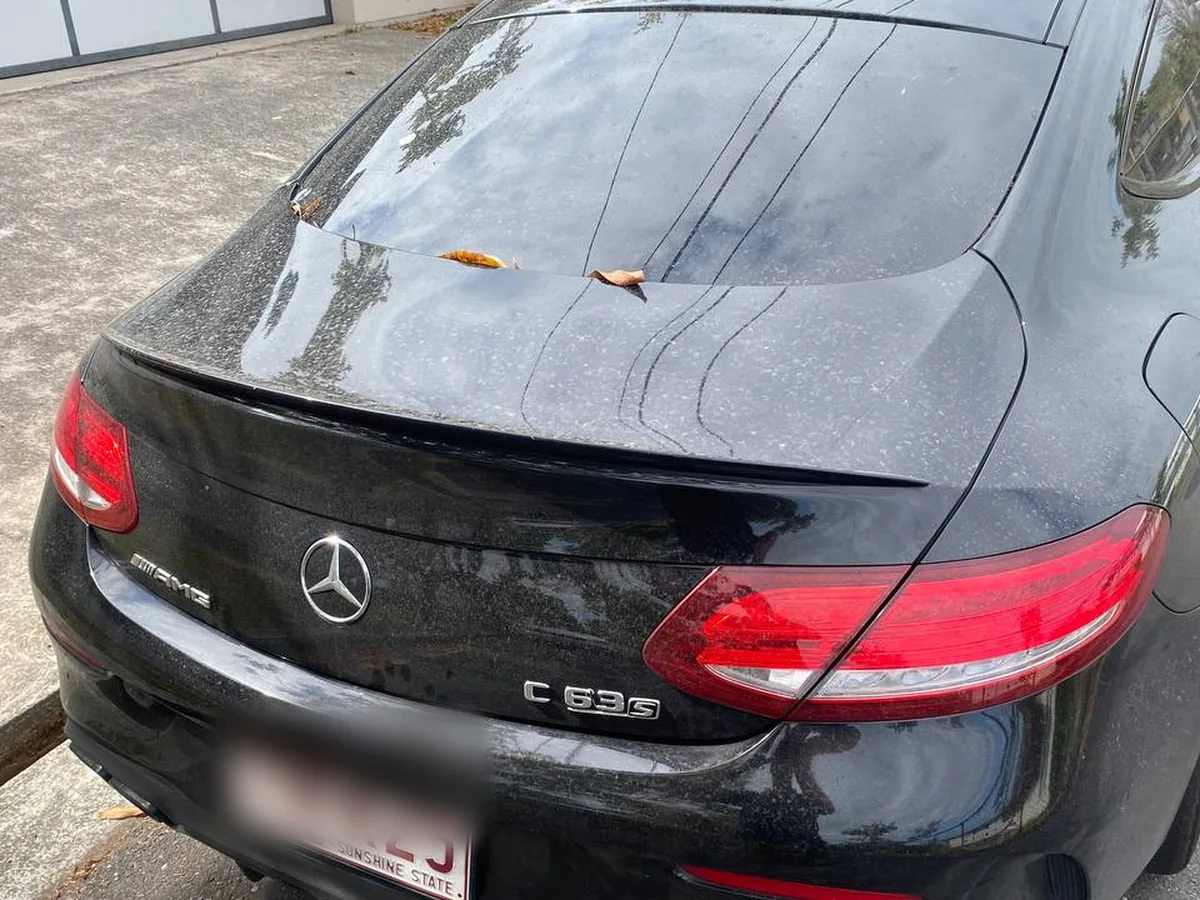Before: Mercedes C63, the same boot lid, before and after